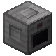 A gray, industrial-looking machine block.