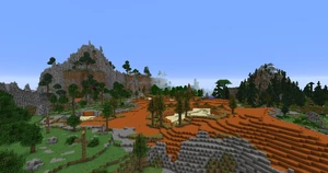 Vast savanna landscape with mountains and trees