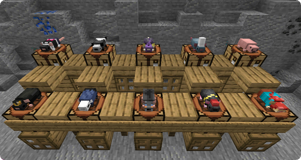 Various mobs on crafting tables in a cave