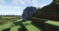 Minecraft landscape with a large rock formation