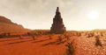 Tall, dark tower in a desert biome