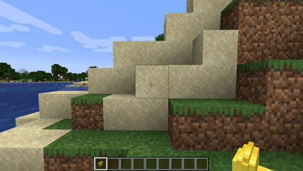 Sand blocks on a grassy hill